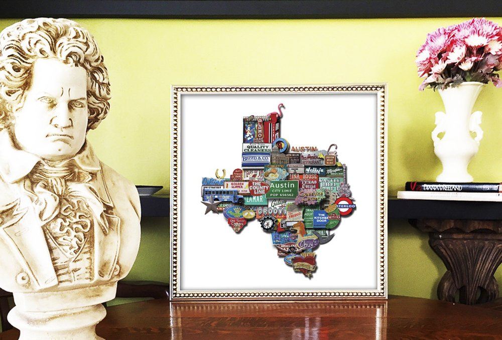 Austin Texas shaped photomontage print featuring iconic Austin images in a detailed map shape of Texas, framed on a table.