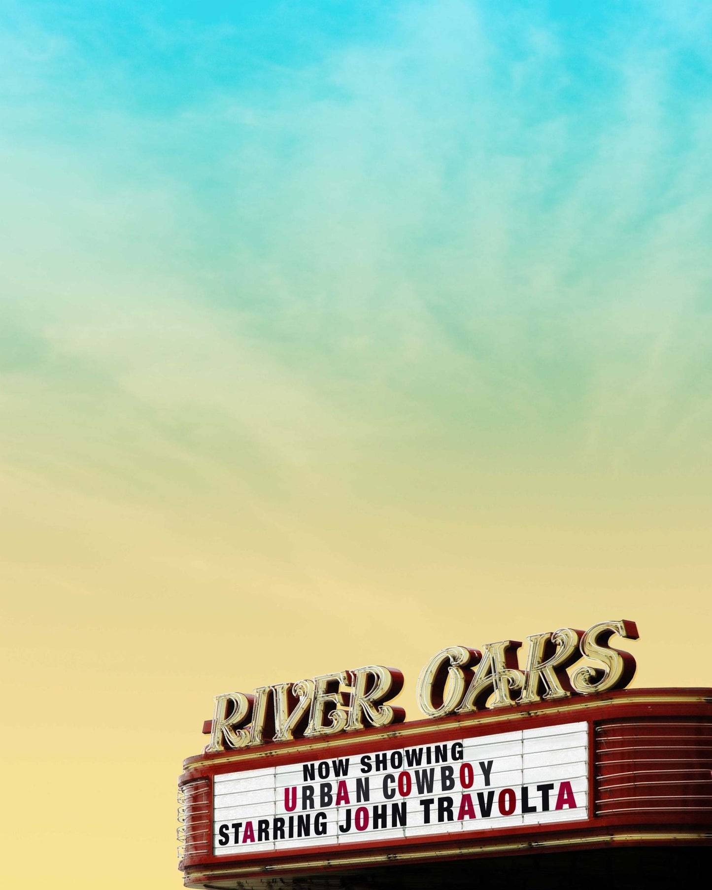 River Oaks Theater marquee in Houston showing Urban Cowboy starring John Travolta at sunset