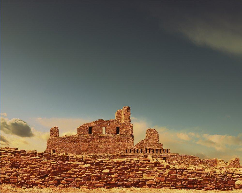 ABO Mission ruins in New Mexico under a turquoise sky photographic art print by Betsy Crum