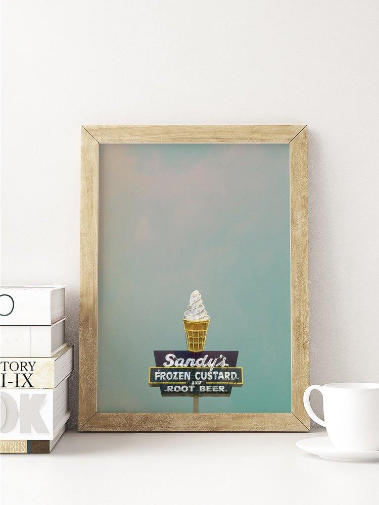 Framed museum print of Sandys Ice Cream Austin Texas sign featuring frozen custard cone against blue sky background