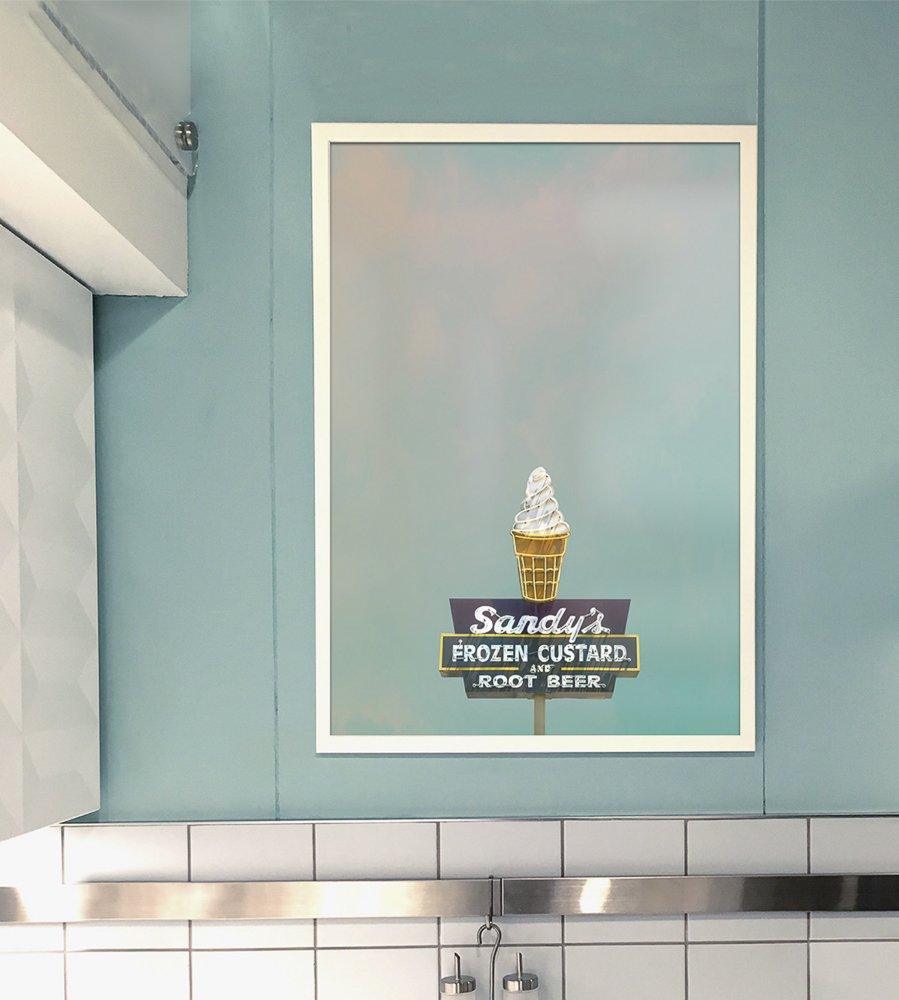 Framed museum print of Sandys Ice Cream Austin Texas frozen custard sign on blue wall