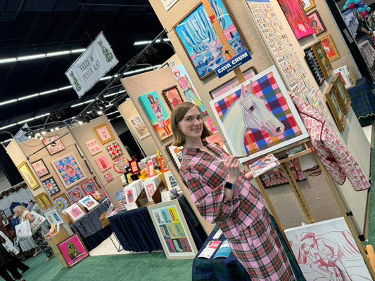 Caya Crum painting Plaid Pony live in the Crum Art booth at Christmas in Cowtown 2026