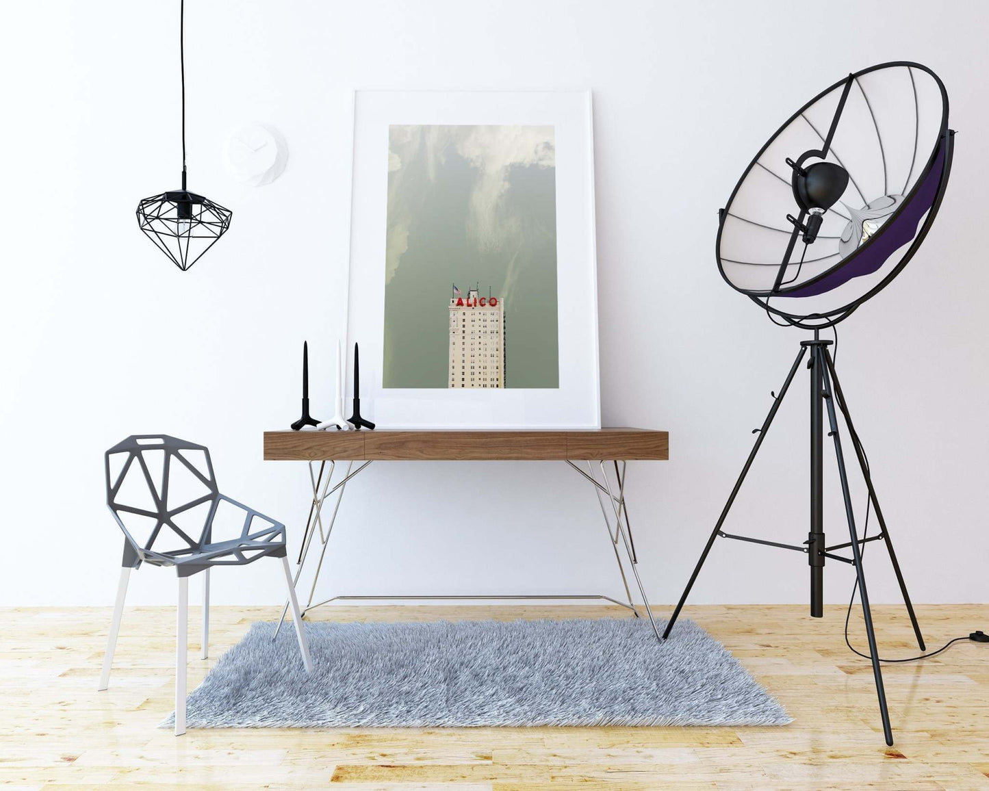 A framed art print of the Alico Building Waco Texas displayed on a wooden console table in a modern minimalist room