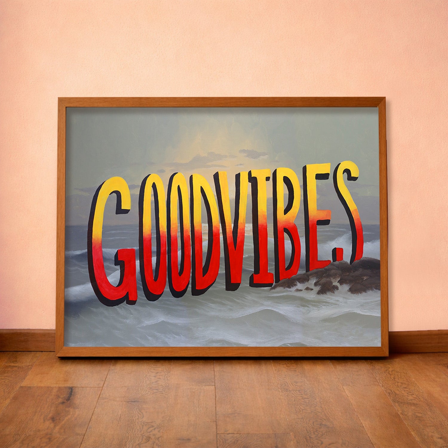 Good Vibes quote art by Caya Crum framed in a lived-in room