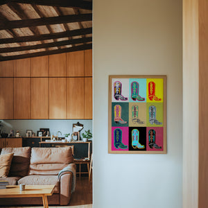 Leddy Boot Warhol cowboy boot art print by Betsy Crum — framed in a wood-accent room