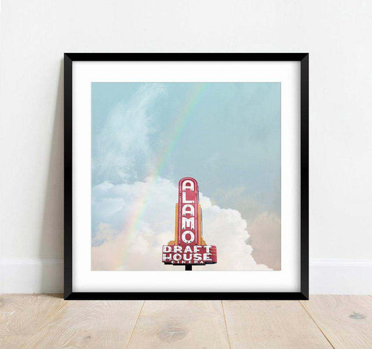 Alamo Drafthouse Sign Print with rainbow and Texas sky fine art giclée by Betsy Crum in black frame
