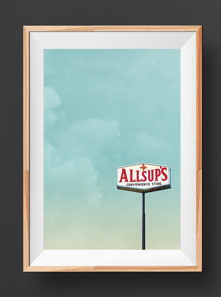 New Mexico Art.  Framed Allsups Art print featuring a vintage Allsups Convenience Store sign against a blue sky with clouds.