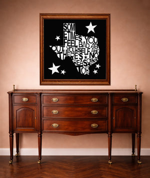 Alvin Ailey Texas-shaped quote print by Betsy Crum in a western styled room