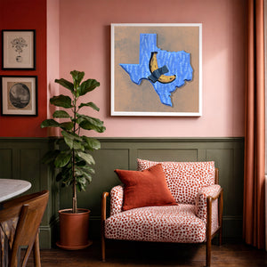 Banana Taped to Texas print framed in an eclectic urban room by Caya Crum — funny Texas wall art from Crum Art, made in Fort Worth.