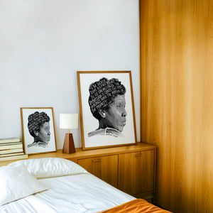 Barbara Jordan Texas art print by Betsy Crum — framed in a wood-accent room