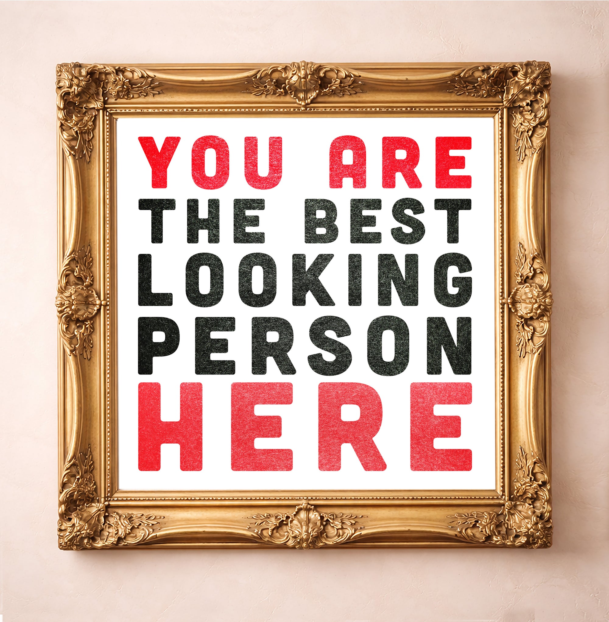 "You Are the Best Looking Person Here", Artr Print by Carl Crum, a matted archival art print in a gold frame inspired by bold typography, playful confidence, and the extra reassurance you didn’t know you needed, available at crumart.com. This museum quality print is made right here in Texas.