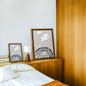 Pennybacker 360 Bridge Austin print by Betsy Crum — framed in a wood-accent room