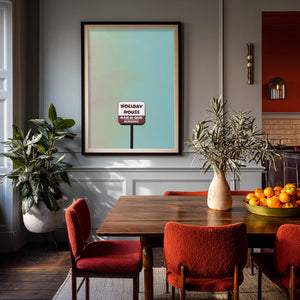 Austin Holiday House Sign shown framed by Crum Art