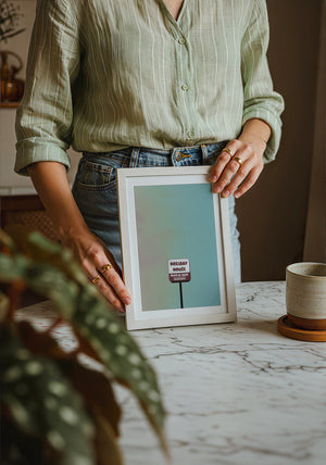 Holiday House Austin print by Betsy Crum — neutral frame room mockup