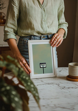 Saxon Pub Austin print by Betsy Crum — neutral frame room mockup