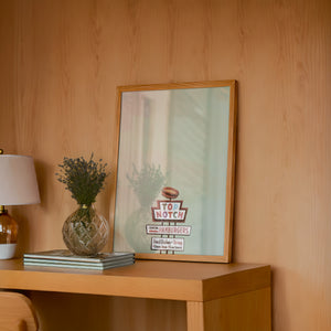 Top Notch Hamburgers Sign Austin art print by Betsy Crum — framed in a wood-accent room