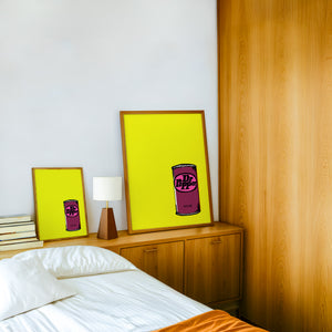 Pop of Yellow Dr Pepper art print by Betsy Crum — framed in a wood-accent room