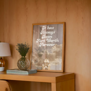Fort Worth Forever art print by Betsy Crum — framed in a wood-accent room