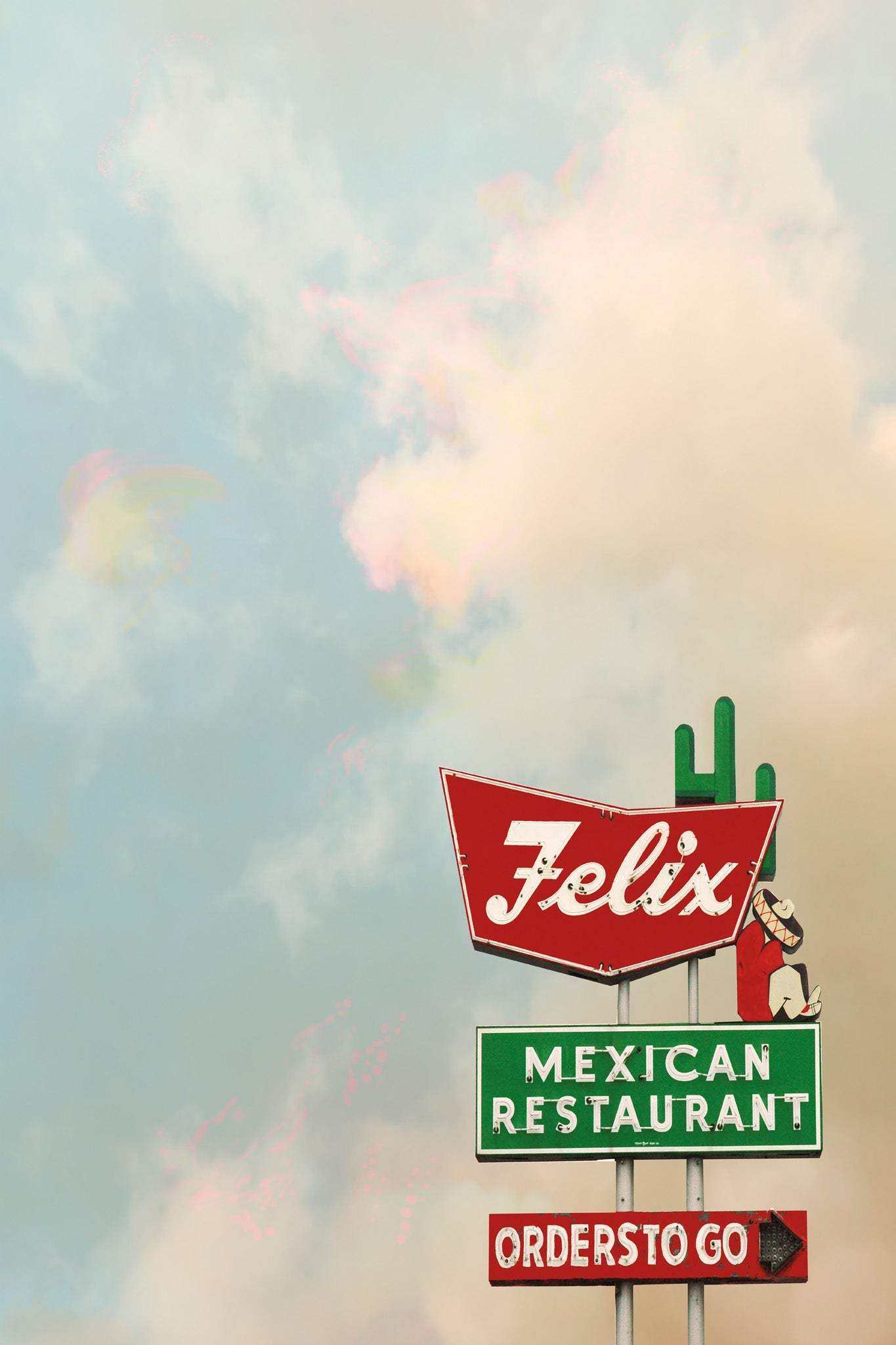Houston Skyline Print featuring Felix Mexican Restaurant sign with blue sky background by Betsy Crum
