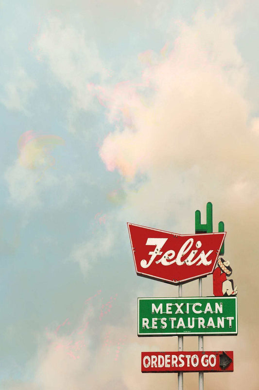 Houston Skyline Print featuring Felix Mexican Restaurant sign with blue sky background by Betsy Crum