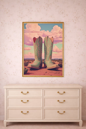 Marfa boots pastel desert print by Betsy Crum framed above a dresser