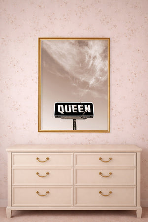 Queen with a Big Sky vintage QUEEN sign print by Betsy Crum shown framed above a dresser