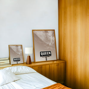 Queen with a Big Sky sepia Texas photography print by Betsy Crum — framed in a wood-accent room