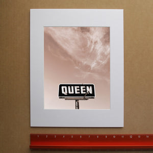 Queen with a Big Sky — sepia photograph of a vintage QUEEN sign under a big Texas sky by Betsy Crum