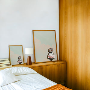 Shipley Do-Nuts Houston art print by Betsy Crum — framed in a wood-accent room