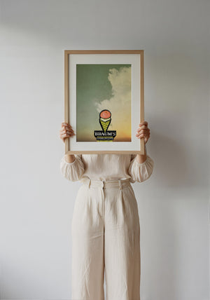 Braum's Sign Big Sky Americana art print by Betsy Crum — framed with velvet mat