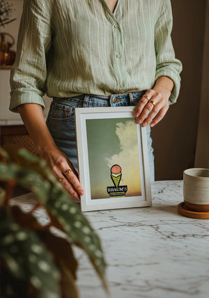 Braum's Sign Big Sky Americana art print by Betsy Crum — neutral frame room mockup
