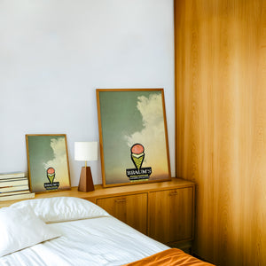 Braum's Sign Big Sky Americana art print by Betsy Crum — framed in a wood-accent room