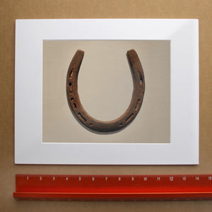 Lucky Horseshoe western art print by Carl Crum — horizontal room scene