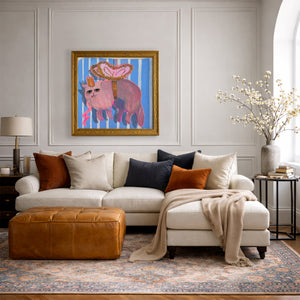 Pink fluffy cat art print by Caya Crum framed in a pink living room, maximalist cat wall art