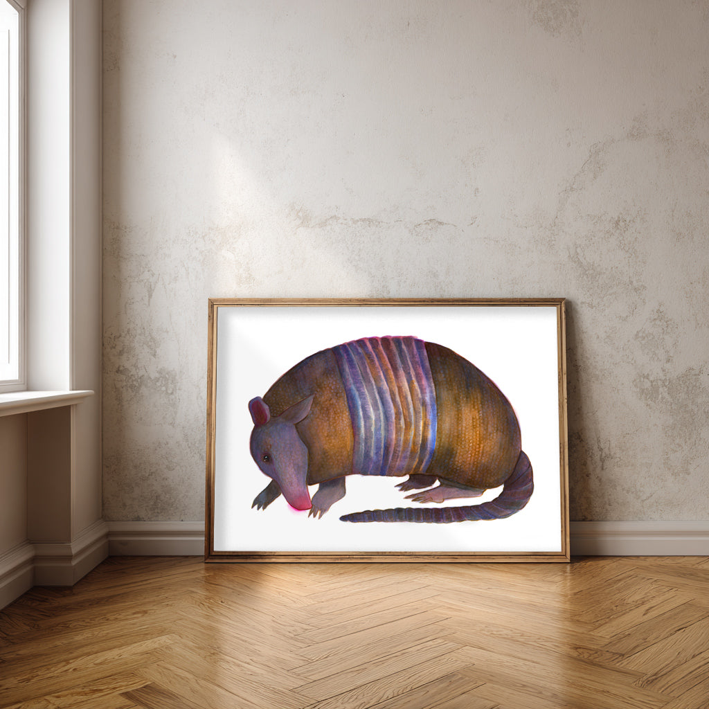 Watercolor armadillo art print by Caya Crum — nine-banded Texas armadillo in purple and brown, framed 16x20