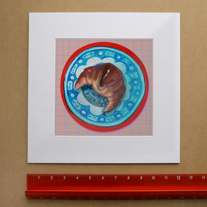 Croissant on a Chinoiserie Plate shown as a matted square print