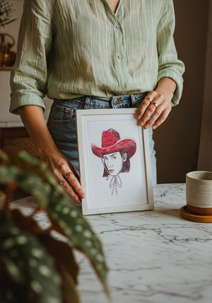 Pen & Ink Self Portrait cowgirl art print by Caya Crum — neutral frame room mockup