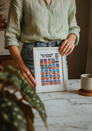 Alphabet of Texas Icons Texas Art print by Caya Crum — neutral frame room mockup