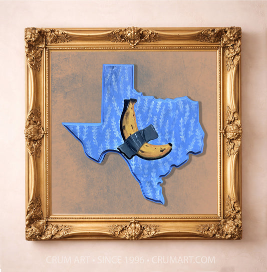 Banana Taped to Texas art print in a gold frame by Caya Crum — a banana duct-taped across a blue Texas-shaped plaque, funny wall art available at crumart.com. This museum quality print is made right here in Texas.