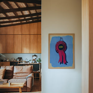 Best in Show Scum Ribbon funny wall art print by Caya Crum — framed in a wood-accent room