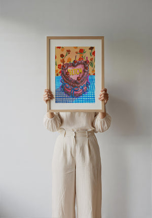 Bitch Cake pink wall art print by Caya Crum — framed with velvet mat