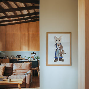 Frankie Fish Cat art print by Caya Crum — framed in a wood-accent room