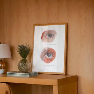 Bowie Eyes Study music wall art print by Caya Crum — framed in a wood-accent room