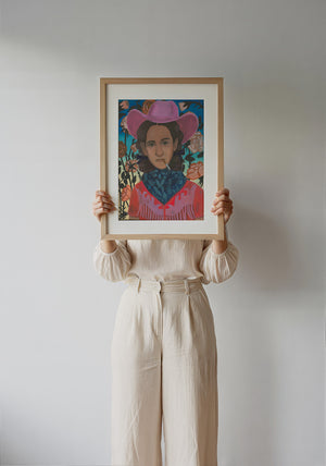 Cowgirls & Flowers cowgirl art print by Caya Crum — framed with velvet mat