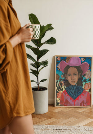 Cowgirls & Flowers cowgirl art print by Caya Crum — framed with velvet mat
