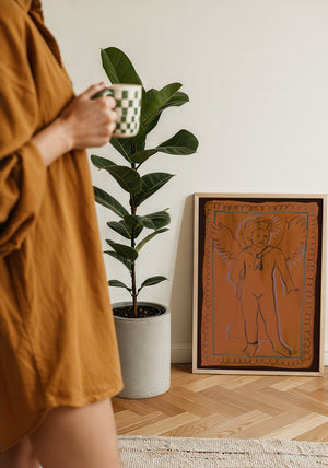 Greco Roman Cupid pink wall art print by Caya Crum — framed with velvet mat