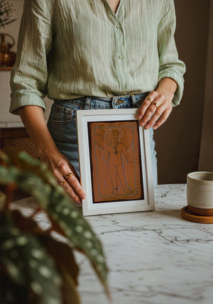 Greco Roman Cupid pink wall art print by Caya Crum — neutral frame room mockup