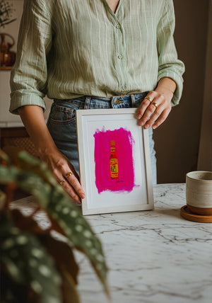 Cholula Hot Sauce kitchen art print by Caya Crum — neutral frame room mockup