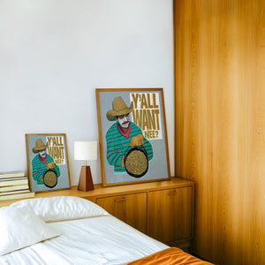 Cowboy Mac and Cheese funny wall art print by Caya Crum — framed in a wood-accent room
