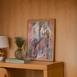 Flowers Desert Romance cowboy art print by Caya Crum — framed in a wood-accent room